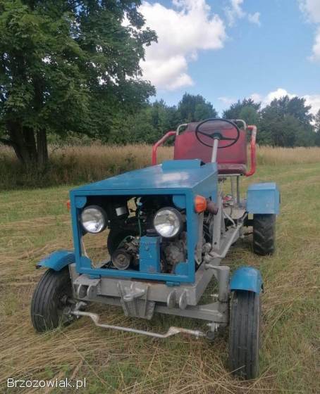 Traktor SAM z pługiem do śniegu (transport po zakupie)