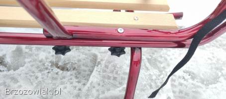 Sanki metalowe z oparciem i pchaczem z zapięciem.