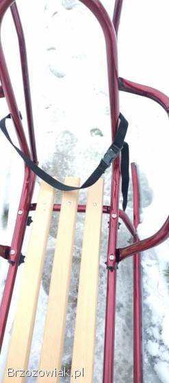 Sanki metalowe z oparciem i pchaczem z zapięciem.