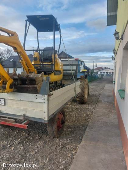 Wynajem,  usługa minikoparką oraz przyczepą z kiprem