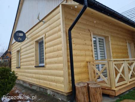 DREWNIANE ELEWACJE MONTAŻ docieplenie wełną montaż fasad drewnianych