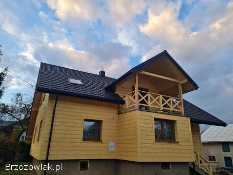 DREWNIANE ELEWACJE MONTAŻ docieplenie wełną montaż fasad drewnianych