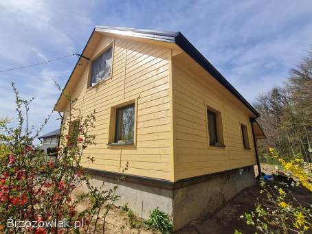 DREWNIANE ELEWACJE MONTAŻ docieplenie wełną montaż fasad drewnianych