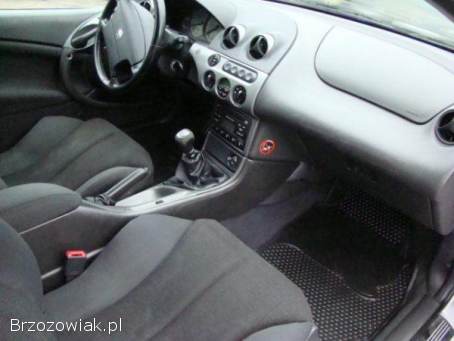 Ford Cougar 2,  5 V6 benz.   1999