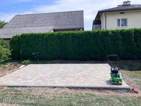 Brukarstwo Ogrodzenia Uslugi koparka wraz z wozidlem.