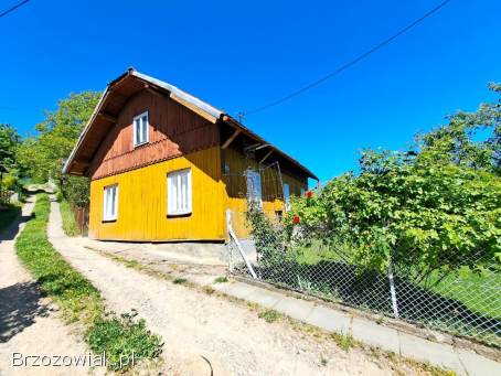 Dom drewniany 77 mkw.  na działkach 9,  92 ar Sanok Wójtostwo