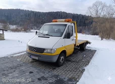 Pomoc drogowa,  usługi autolawetą