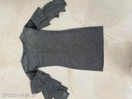 Sprzedam sukienki dla dziewczynki rozmiar 122