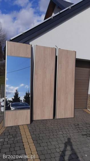 Drzwi przesuwne do szafy-lustro szyny