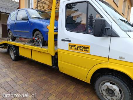 Pomoc drogowa,  usługi autolawetą