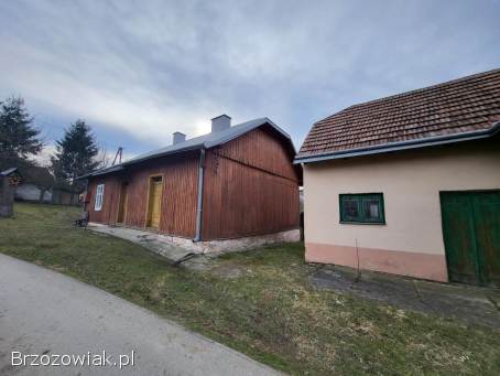 Dom z budynkiem gospodarczym.  Faliszówka