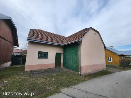 Dom z budynkiem gospodarczym.  Faliszówka