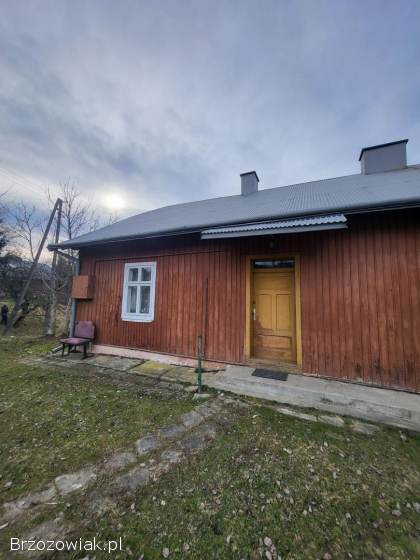 Dom z budynkiem gospodarczym.  Faliszówka