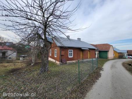 Dom z budynkiem gospodarczym.  Faliszówka