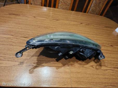 Lampa przednia lewa OPEL ASTRA J