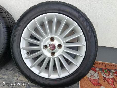 Oryginalne Alufelgi z Oponami Fiat Linea 4X98 Świeże opony (DOT5124)