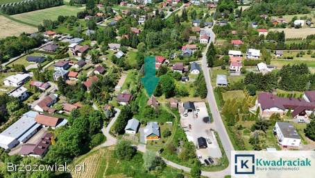 Drewniany dom z budynkiem gospodarczym w Potoku (gm.  Jedlicze)