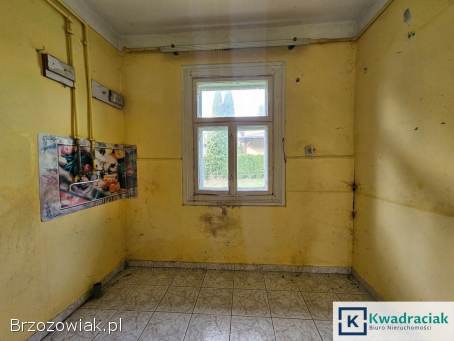Drewniany dom z budynkiem gospodarczym w Potoku (gm.  Jedlicze)