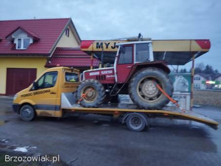 Pomoc drogowa usługi autolawetą przewóz pojazdów