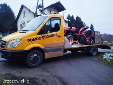 Pomoc drogowa usługi autolawetą przewóz pojazdów