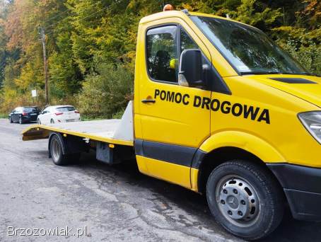 Pomoc drogowa usługi autolawetą przewóz pojazdów